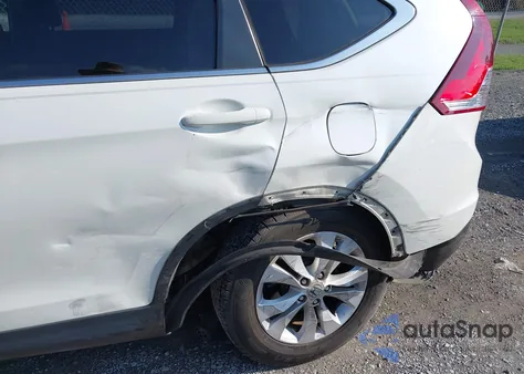 2013 Honda Cr-V Exl z USA, uszkodzony, nr VIN 5J6RM3H78DL038105